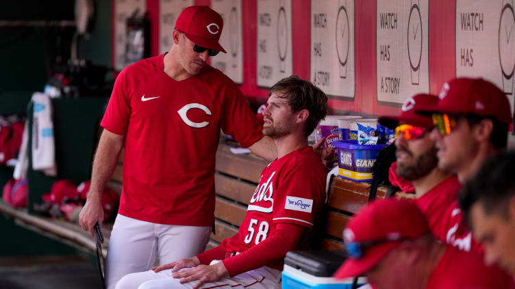Cincinnati Reds assistant pitching coach Alon Leichman talks with starting pitcher Levi Stoudt