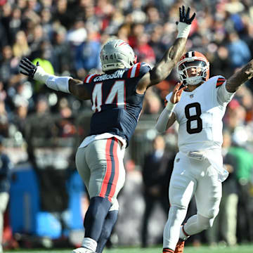 Oct 26, 2025; Foxborough, Massachusetts, USA;  Cleveland Browns quarterback Dillon Gabriel (8) throws the ball defended by New England Patriots linebacker K'Lavon Chaisson (44) during the second quarter at Gillette Stadium. Mandatory Credit: Brian Fluharty-Imagn Images