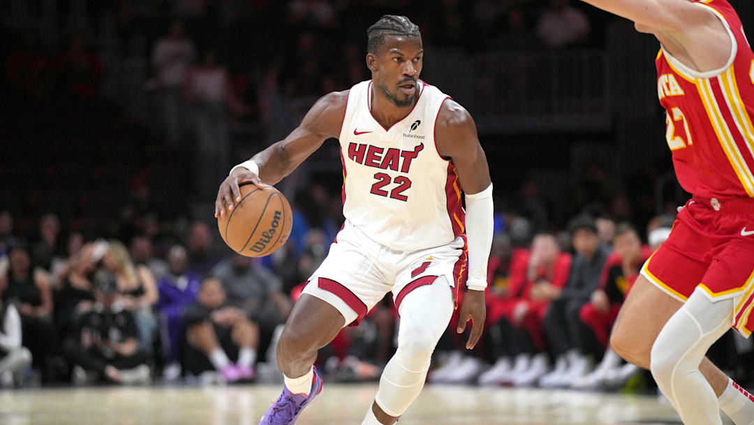Oct 16, 2024; Miami, Florida, USA; Miami Heat forward Jimmy Butler (22) brings the ball up the court as Atlanta Hawks guard Vit Krejci (27) defends in the first half at Kaseya Center. Mandatory Credit: Jim Rassol-Imagn Images Oct 16, 2024; Miami, Florida, USA; Miami Heat forward Jimmy Butler (22) brings the ball up the court as Atlanta Hawks guard Vit Krejci (27) defends in the first half at Kaseya Center. Mandatory Credit: Jim Rassol-Imagn Images