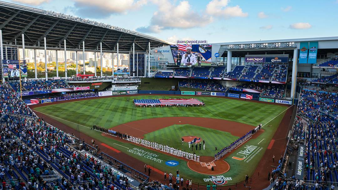 Mar 27, 2026; Miami, Florida, USA; A view of the stadium as players from the Miami Marlins and the Colorado Rockies listen to the national anthem before the game at loanDepot Park. Mandatory Credit: Sam Navarro-Imagn Images