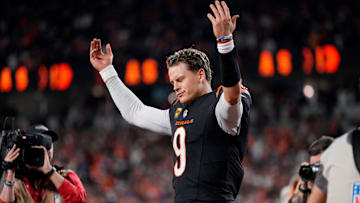 Cincinnati Bengals quarterback Joe Burrow (9) celebrates after the game-winning touchdown pass to Tee Higgins in overtime of the NFL Week 17 game between the Cincinnati Bengals and the Denver Broncos at Paycor Stadium in downtown Cincinnati on Saturday, Dec. 28, 2024. The Bengals took a 30-24 win in overtime to remain in the post season chase.