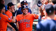 Sep 28, 2025; Anaheim, California, USA; Houston Astros catcher Yainer Diaz (21) is greeted by teammates after hitting a home run during the fifth inning against the Los Angeles Angels at Angel Stadium. 