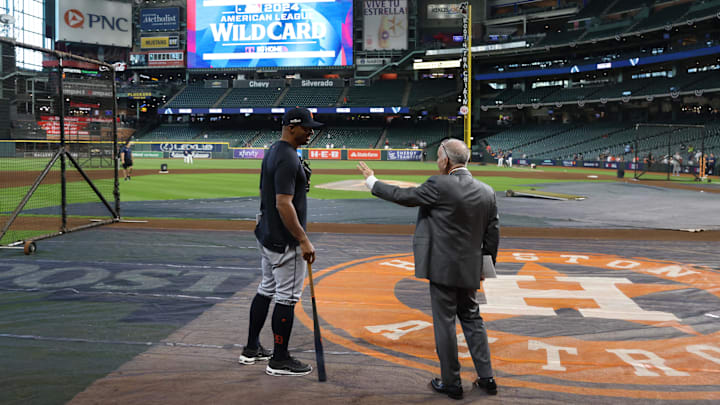 Detroit Tigers bench coach George Lombard talks with Tim Kurkjian of ESPN before game two of the Wildcard round for the 2024 MLB Playoffs against the Houston Astros. Detroit Tigers bench coach George Lombard talks with Tim Kurkjian of ESPN before game two of the Wildcard round for the 2024 MLB Playoffs against the Houston Astros.