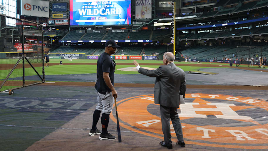 Detroit Tigers bench coach George Lombard talks with Tim Kurkjian of ESPN before game two of the Wildcard round for the 2024 MLB Playoffs against the Houston Astros. | Thomas Shea-Imagn Images