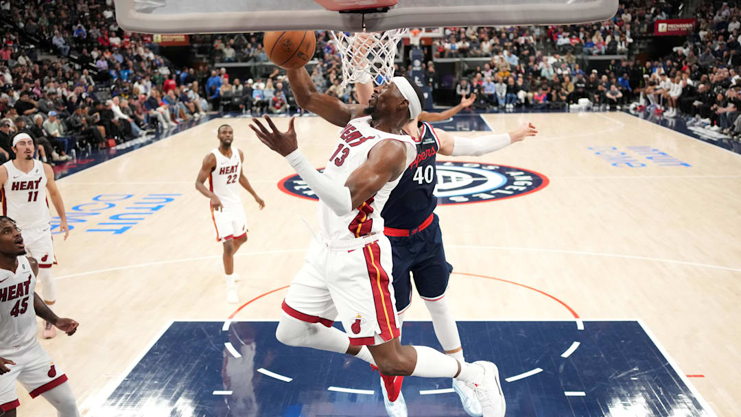 Nov 3, 2025; Inglewood, California, USA; Miami Heat center Bam Adebayo (13) shoots the ball against LA Clippers center Ivica Zubac (40) in the first half at Intuit Dome. Mandatory Credit: Kirby Lee-Imagn Images