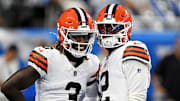 Sep 28, 2025; Detroit, Michigan, USA; Cleveland Browns wide receiver Jerry Jeudy (3) and Cleveland Browns quarterback Shedeur Sanders (12) warm up before the game against the Detroit Lions at Ford Field. Mandatory Credit: Lon Horwedel-Imagn Images