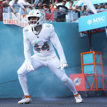 Miami Dolphins linebacker Chop Robinson (44) enters the field prior to a game against the Los Angeles Chargers at Hard Rock Stadium in Week 6.