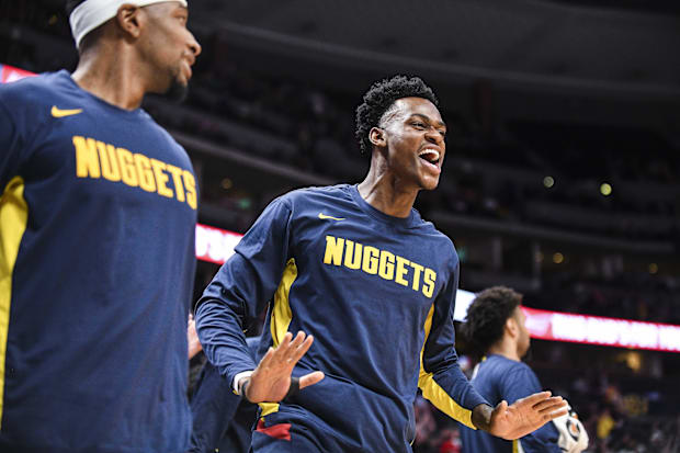 Denver Nuggets forward Jarred Vanderbilt (8) celebrates a foul against the Portland Trail Blazers during the first half at Pe