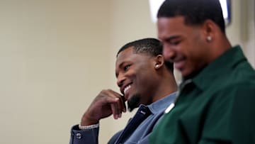 Tee Higgins smiles between questions during a press conference to announce the signing of new contracts for Cincinnati Bengals wide receivers Ja’Marr Chase and Tee Higgins at Paycor Stadium in downtown Cincinnati on Tuesday, March 18, 2025. Chase becomes the new highest-paid non-quarterback player in the NFL.