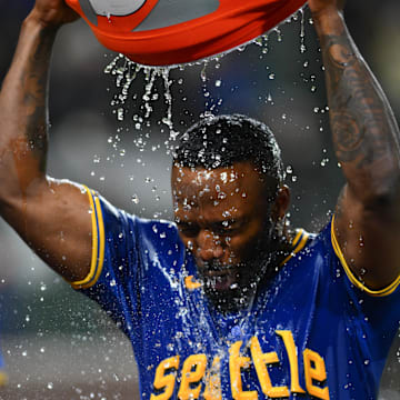 Seattle Mariners designated hitter Randy Arozarena (56) celebrates after hitting a walk-off single against the Texas Rangers during the ninth inning at T-Mobile Park on Sept 14.