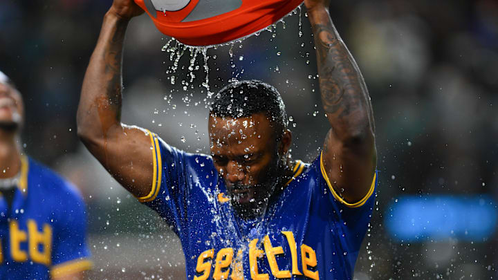 Seattle Mariners designated hitter Randy Arozarena (56) celebrates after hitting a walk-off single against the Texas Rangers during the ninth inning at T-Mobile Park on Sept 14.