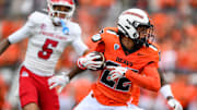 Sep 6, 2025; Corvallis, Oregon, USA; Oregon State Beavers defensive back Jalil Tucker (22) intercepts a pass intended for Fresno State Bulldogs wide receiver Josiah Freeman (5) during the second quarter at Reser Stadium. Mandatory Credit: Craig Strobeck-Imagn Images