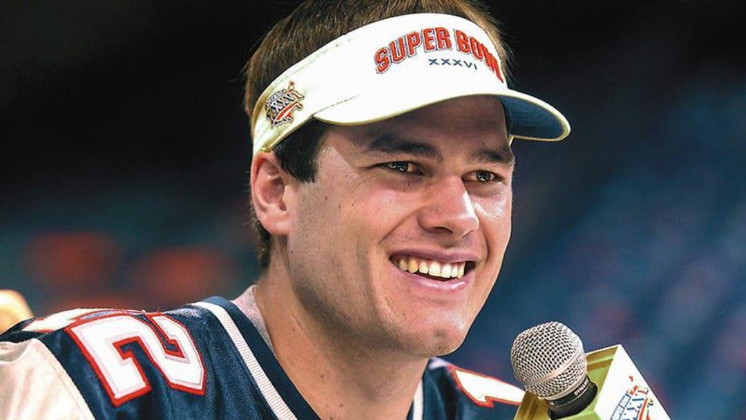 In 2002, Tom Brady at media day at the New Orleans Superdome as both the New England Patriots and the St. Louis Rams answered questions from media personnel 