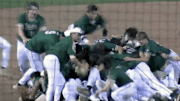 Blessed Trinity baseball players pile on each other in celebration of their GHSA AAAA state championship victory.