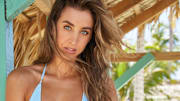 Katie Austin was photographed by James Macari in the Dominican Republic. Swimsuit by Asta Resort.