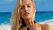 Paige Spiranac was photographed by James Macari in Aruba. Swimsuit by HAUS OF PINKLEMONAID.