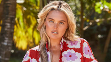 Georgina Burke was photographed by Ben Watts in Puerto Rico. Swimsuit by Ola Vida. Top by PatBO.