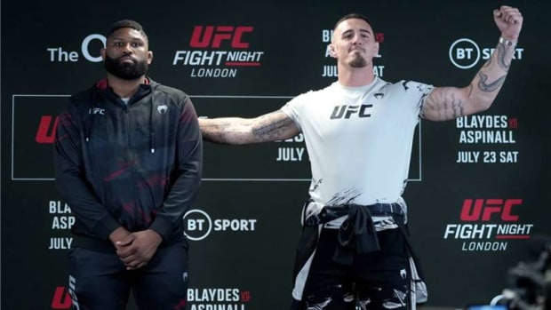 Tom Aspinall and Curtis Blaydes pose for the cameras ahead of their interim title fight at UFC 304.