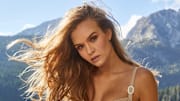 Josephine Skriver was photographed by James Macari in Montenegro. Swimsuit by Medina Swimwear. Scarf by Hermes. Boots by Sam Edelman.