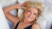Martha Stewart was photographed by Ruven Afanador in the Dominican Republic. Swimsuit by Zimmermann. Sarong by Alix Pinho. Earrings by Cicada.