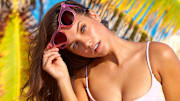 Barbara Palvin was photographed by Ben Watts in Curacao. Swimsuit by Tori Praver Swimwear.