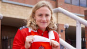 Former Nebraska forward Eleanor Dale poses with a Sunderland AFC scarf after signing to play for the Black Cats.