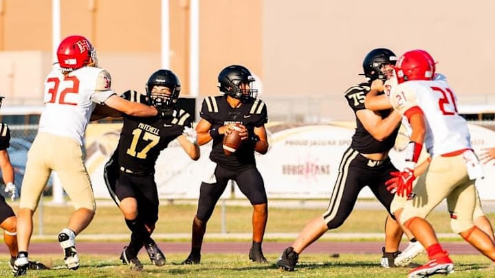 Mitchell quarterback Cayden Thomas against Hudson in the spring of 2024 Mitchell quarterback Cayden Thomas against Hudson in the spring of 2024