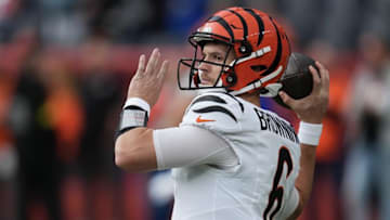 Bengals quarterback Jake Browning warms up before facing the Broncos.