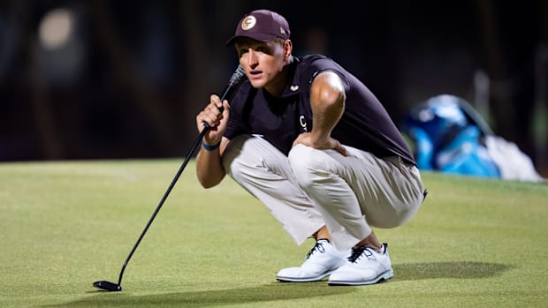 Adrian Meronk lines up a putt at LIV Riyadh.