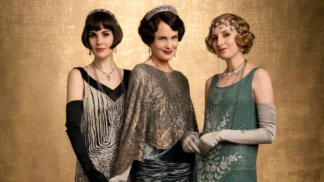 NBC'S RETURN TO DOWNTON ABBEY: A GRAND EVENT -- "Downton Abbey" -- Pictured: Michelle Dockery as Lady Mary Talbot, Elizabeth McGovern as Lady Grantham and Laura Carmichael as Lady Hexham -- (Photo by: Jason Bell/Focus Features)