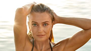 Paulina Porizkova was photographed by Yu Tsai in Kenya. Swimsuit by Ola Vida.