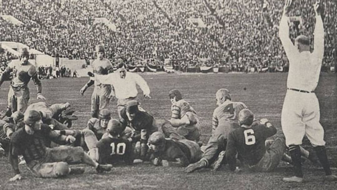Pooley Hubert scores Alabama's first touchdown to begin the Crimson Tide's comeback against Washington in the 1926 Rose Bowl.