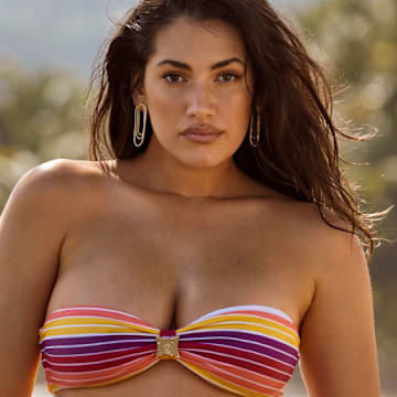 Lorena Durán was photographed by Ben Watts in Puerto Rico. Swimsuit by Lybethras. Earrings by Jennifer Zeuner Jewelry.