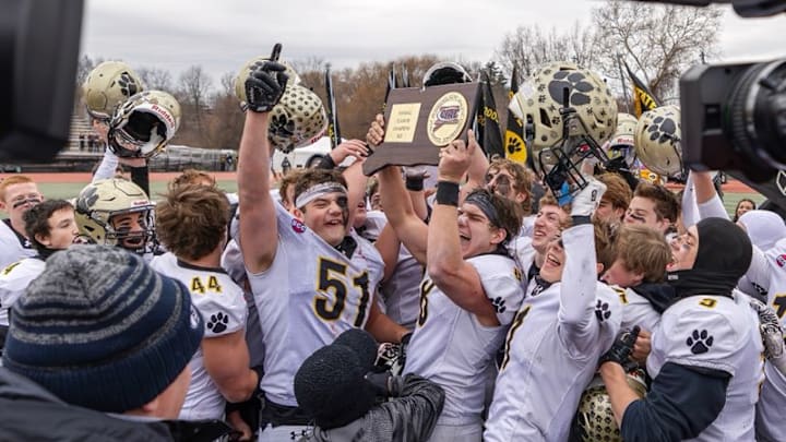 The Hand Tigers football team celebrate its 2025 CIAC Class SS championship victory over the Killingly Trailblazers at Veteran’s Stadium in New Britain, Connecticut on Dec. 13, 2025. The Hand Tigers football team celebrate its 2025 CIAC Class SS championship victory over the Killingly Trailblazers at Veteran’s Stadium in New Britain, Connecticut on Dec. 13, 2025.