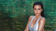 Kim Kardashian was photographed by Greg Swales in the Dominican Republic. Swimsuit by SKIMS. 
