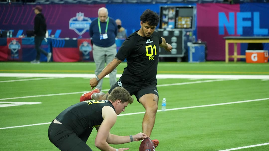 Feb 26, 2025; Indianapolis, IN, USA; Miami place kicker Andy Borregales (PK01) attempts a field goal during workouts at the 2025 NFL Scouting Combine at Lucas Oil Stadium. Mandatory Credit: Kirby Lee-Imagn Images