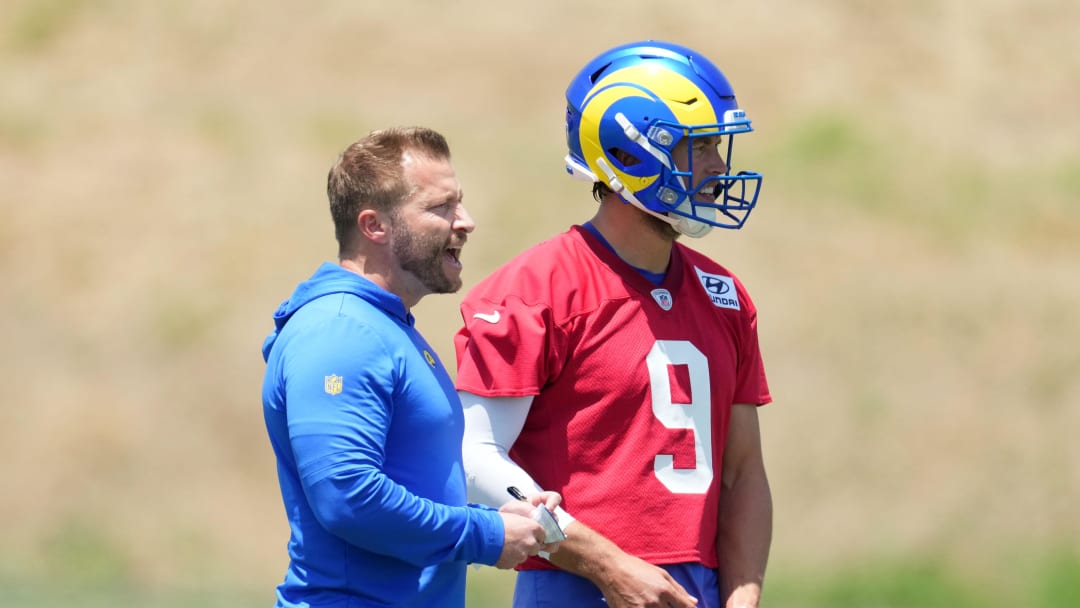 May 21, 2024, Thousand Oaks, California, USA; Los Angeles Rams coach Sean McVay (left) talks with quarterback Matthew Stafford (9) during organized team activities at Cal Lutheran University. Mandatory Credit: Kirby Lee-USA TODAY Sports