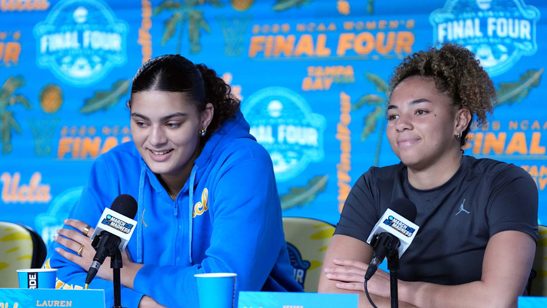 Apr 3, 2025; Tampa, FL, USA; UCLA Bruins center Lauren Betts (left) and guard Kiki Rice at press conference at Amalie Arena. Mandatory Credit: Kirby Lee-Imagn Images