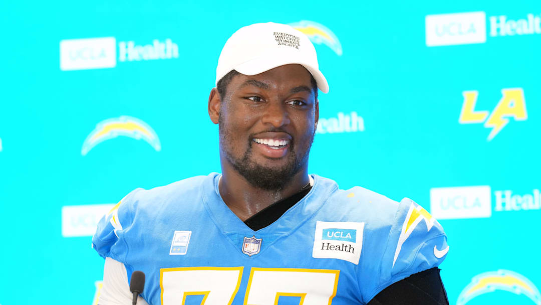 Jul 25, 2025; El Segundo, CA, USA; Los Angeles Chargers guard Zion Johnson (77) during training camp press conference at The Bolt. Mandatory Credit: Kirby Lee-Imagn Images