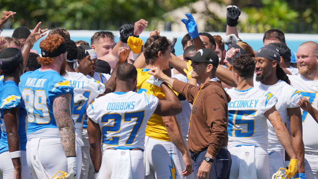 Jun 13, 2024; Costa Mesa, CA, USA; Los Angeles Chargers head coach Jim Harbaugh interacts with his team during minicamp at the Hoag Performance Center.  Mandatory Credit: Kirby Lee-USA TODAY Sports