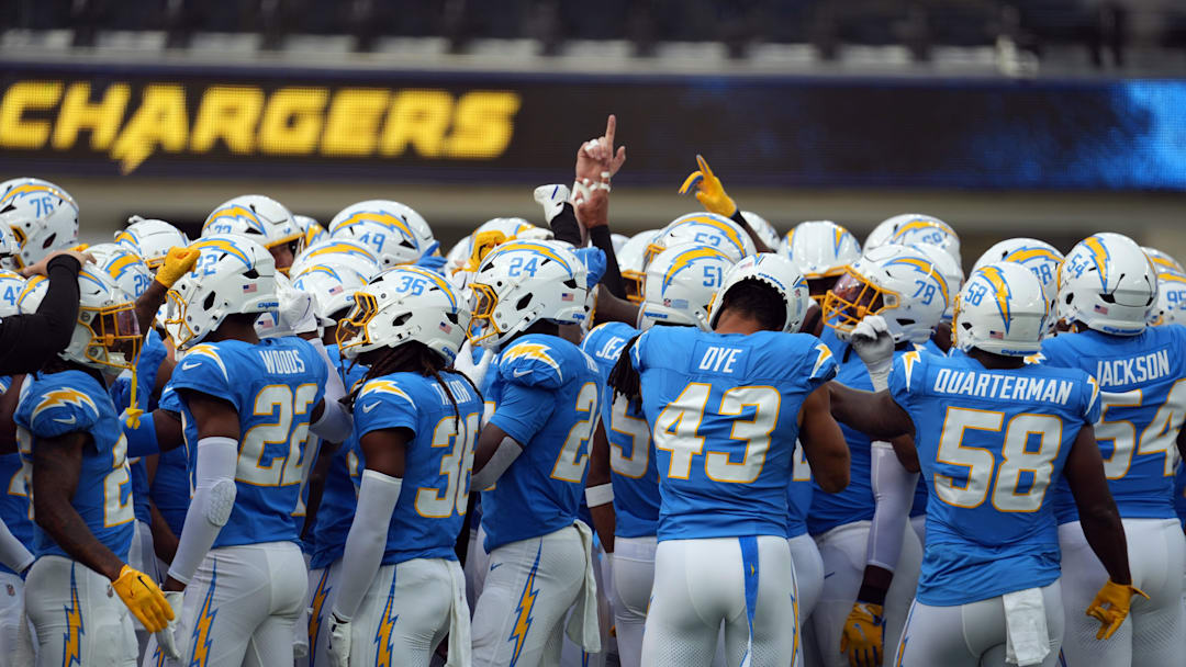 Aug 17, 2024; Inglewood, California, USA; Los Angeles Chargers players huddle during the game against the Los Angeles Rams at SoFi Stadium. Mandatory Credit: Kirby Lee-Imagn Images