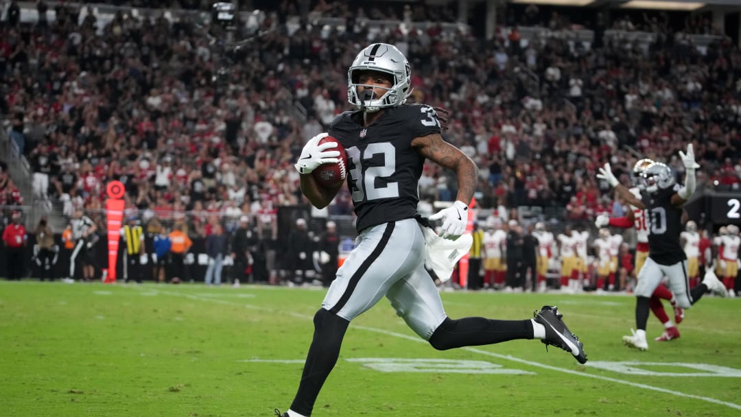 Aug 23, 2024; Paradise, Nevada, USA; Las Vegas Raiders wide receiver Tyreik McAllister (32) scores on an 81-yard punt return against the San Francisco 49ers in the first half at Allegiant Stadium. Mandatory Credit: Kirby Lee-USA TODAY Sports