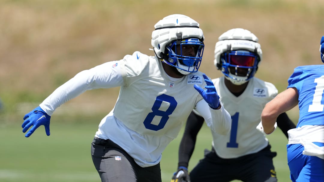 May 21, 2024, Thousand Oaks, California, USA; Los Angeles Rams defensive end Jared Verse (8) wears a Guardian helmet cap during organized team activities at Cal Lutheran University. Mandatory Credit: Kirby Lee-Imagn Images
