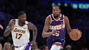 Mar 16, 2025; Los Angeles, California, USA; Phoenix Suns forward Kevin Durant (35) dribbles the ball against Los Angeles Lakers forward Dorian Finney-Smith (17) in the second half at Crypto.com Arena. Mandatory Credit: Kirby Lee-Imagn Images