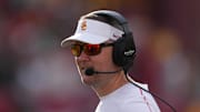 Nov 30, 2024; Los Angeles, California, USA; Southern California Trojans head coach Lincoln Riley reacts against the Notre Dame Fighting Irish in the second half at United Airlines Field at Los Angeles Memorial Coliseum. Mandatory Credit: Kirby Lee-Imagn Images