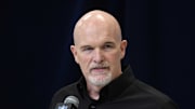 Washington Commanders coach Dan Quinn speaks during the NFL Scouting Combine at the Indiana Convention Center.