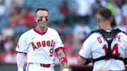 Jul 11, 2025; Anaheim, California, USA; Los Angeles Angels shortstop Zach Neto (9) is greeted by catcher Logan O'Hoppe (14) after hitting a home run in the first inning Arizona Diamondbacks at Angel Stadium. Mandatory Credit: Kirby Lee-Imagn Images