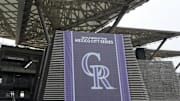 Apr 26, 2024; Mexico City, Mexico;  A banner with the Colorado Rockies logo at Estadio Alfredo Harp Helu. Mandatory Credit: Kirby Lee-Imagn Images