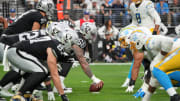 Dec 4, 2022; Paradise, Nevada, USA; Helmets at the line of scrimmage as Las Vegas Raiders center