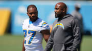 Jun 13, 2024; Costa Mesa, CA, USA; Los Angeles Chargers running back running back J.K. Dobbins (27) and running backs coach Kiel McDonald during minicamp at the Hoag Performance Center. Mandatory Credit: Kirby Lee-USA TODAY Sports